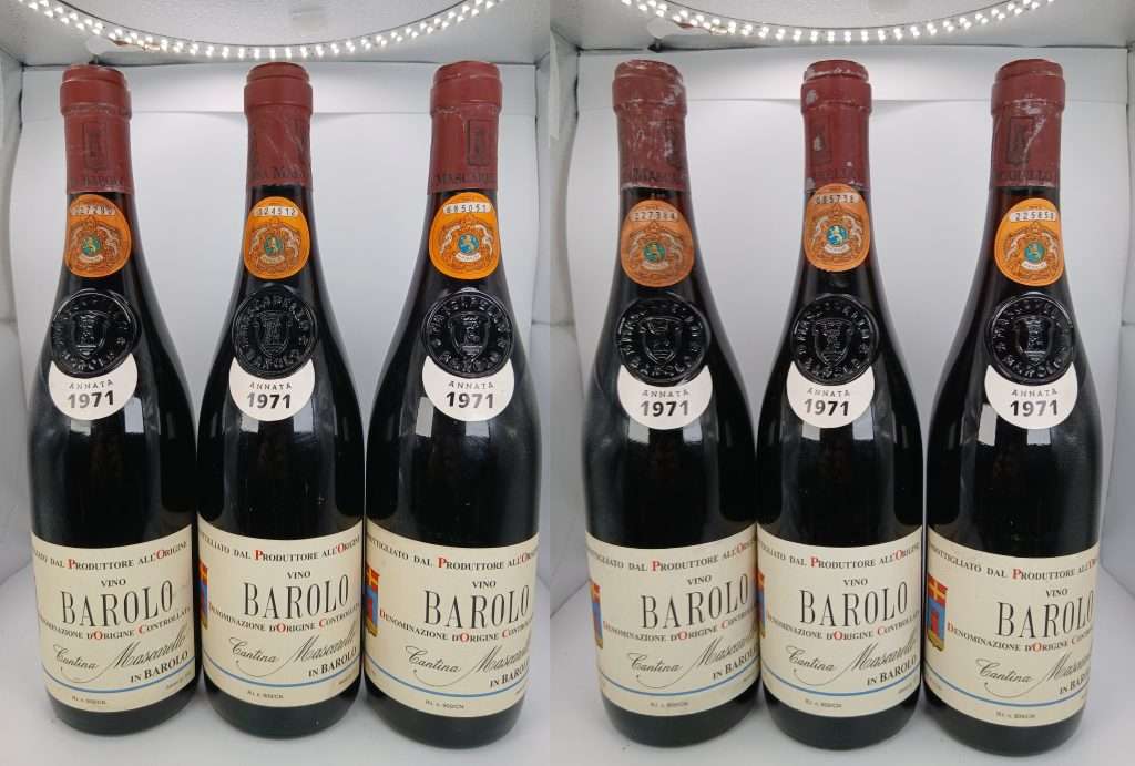 Six bottles of 1971 Barolo with red wax capsules standing in a row.