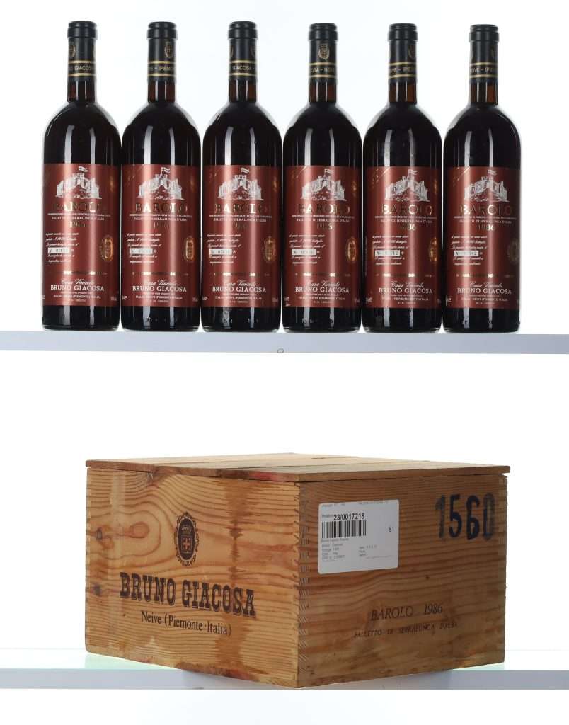 Six bottles standing above a Bruno Giacosa wooden original case.